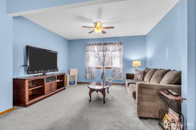 living room featuring carpet, visible vents, baseboards, and ceiling fan