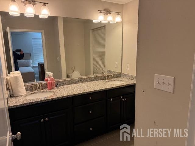 bathroom featuring vanity and tile patterned floors