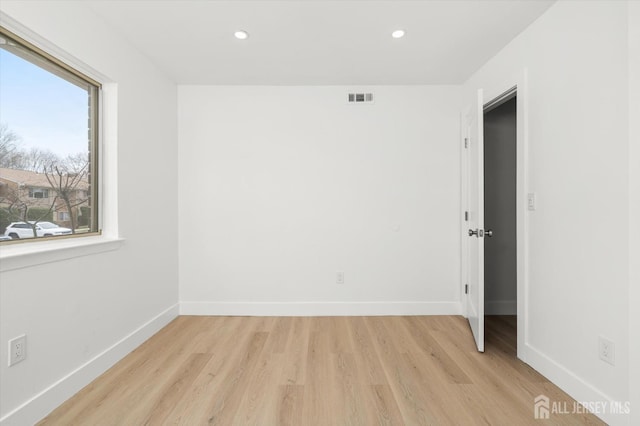 511 Bradley Ct, South Brunswick, NJ 08540 - empty room featuring light wood finished floors, baseboards, visible vents, and recessed lighting