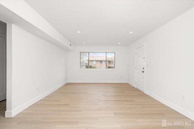 511 Bradley Ct, South Brunswick, NJ 08540 - spare room featuring recessed lighting, light wood-type flooring, and baseboards