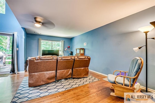 76 Letts Ct Unit 167, Old Bridge, NJ 07747 - living area featuring wood finished floors and a ceiling fan