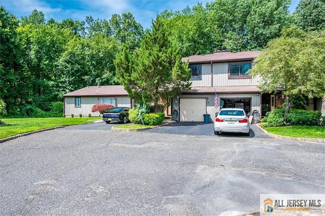 76 Letts Ct Unit 167, Old Bridge, NJ 07747 - view of property with a garage and driveway