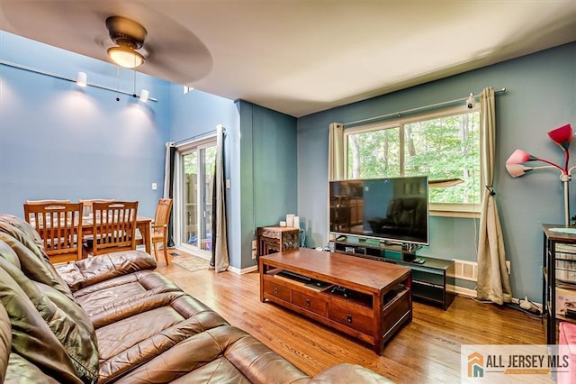 76 Letts Ct Unit 167, Old Bridge, NJ 07747 - living room with wood finished floors and baseboards