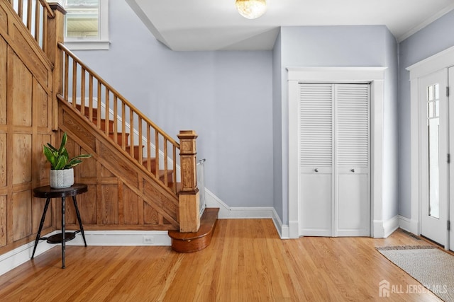 31 Riva Ave, Milltown, NJ 08850 - entryway featuring light wood-style flooring, stairway, and baseboards