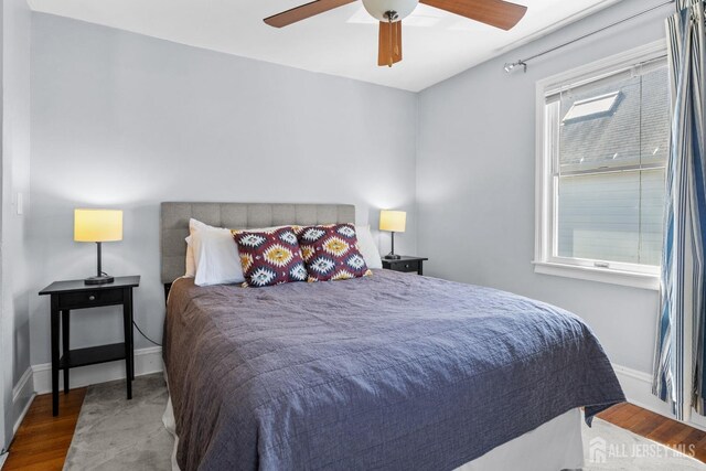 31 Riva Ave, Milltown, NJ 08850 - bedroom featuring baseboards, wood finished floors, and ceiling fan