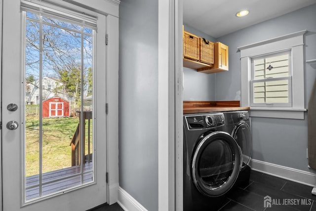 31 Riva Ave, Milltown, NJ 08850 - laundry area with washer and clothes dryer, baseboards, dark tile patterned floors, and recessed lighting