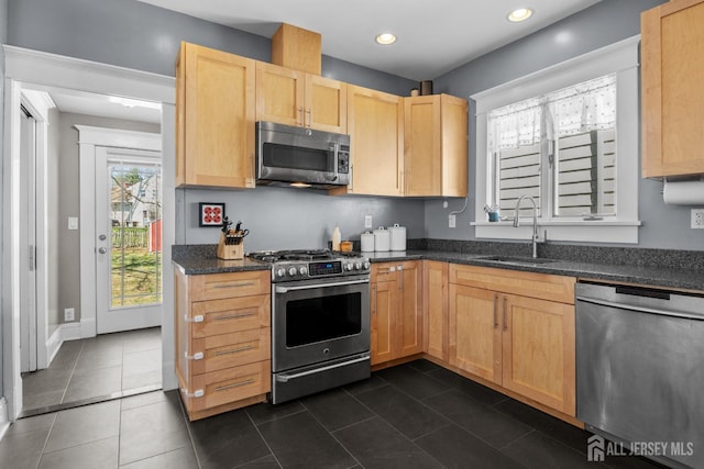 31 Riva Ave, Milltown, NJ 08850 - kitchen featuring stainless steel appliances, a sink, light brown cabinets, dark tile patterned floors, and recessed lighting