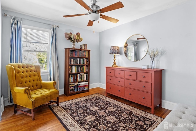 31 Riva Ave, Milltown, NJ 08850 - living area featuring light wood finished floors, a ceiling fan, and baseboards