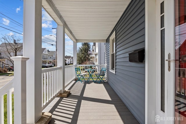 31 Riva Ave, Milltown, NJ 08850 - balcony with a porch and a residential view