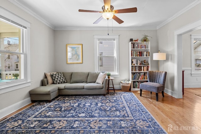 31 Riva Ave, Milltown, NJ 08850 - living room with plenty of natural light, wood finished floors, ceiling fan, ornamental molding, and baseboards