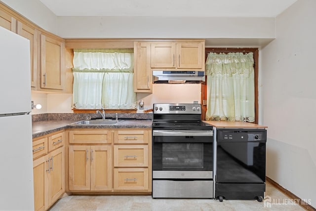 kitchen featuring under cabinet range hood, stainless steel electric range, freestanding refrigerator, dishwasher, and dark countertops