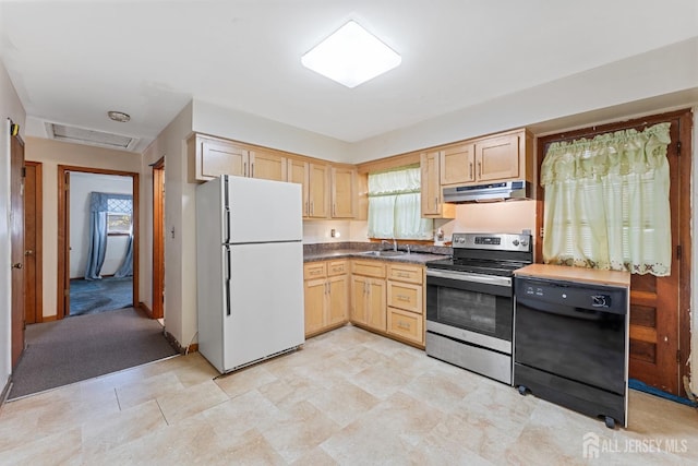 kitchen with black dishwasher, dark countertops, electric range, freestanding refrigerator, and under cabinet range hood