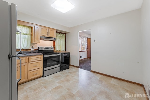 kitchen featuring dark countertops, under cabinet range hood, light brown cabinets, and appliances with stainless steel finishes