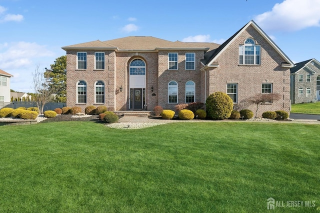 view of front facade with a front yard