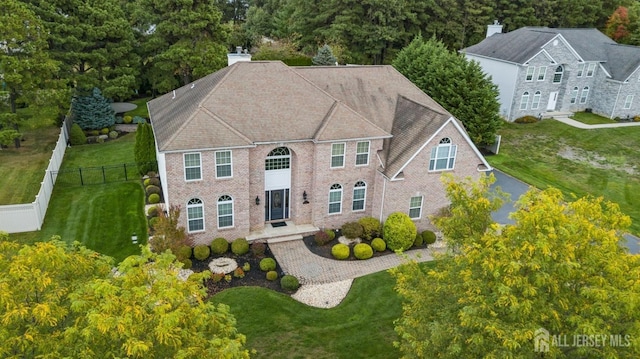 view of front facade with a front lawn