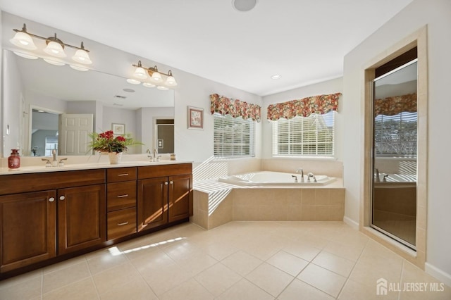 bathroom featuring tile patterned floors, vanity, and independent shower and bath