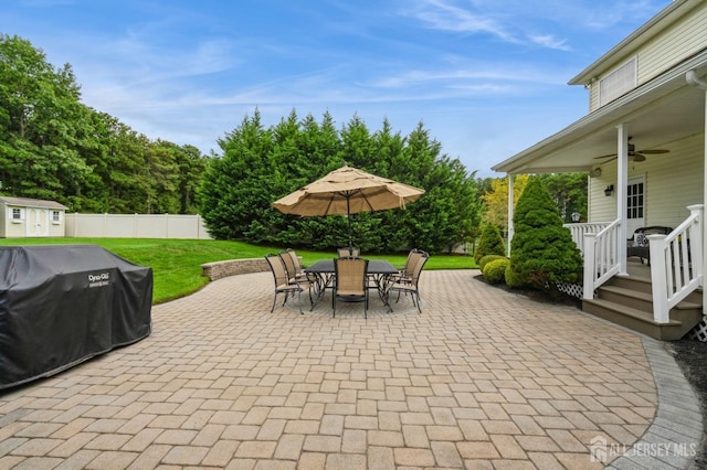 view of patio / terrace with ceiling fan and area for grilling