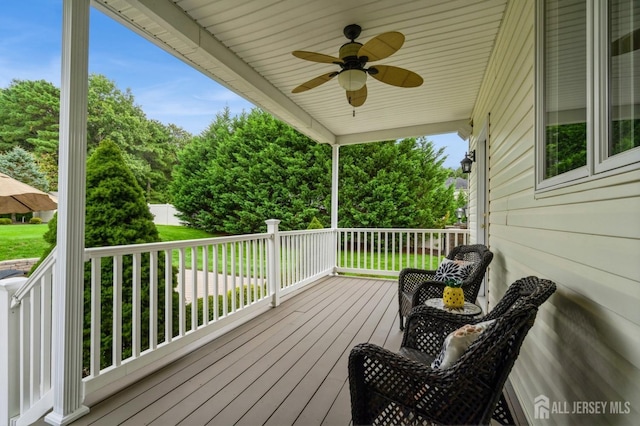 wooden terrace with ceiling fan