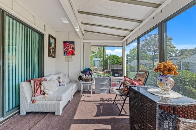 sunroom with vaulted ceiling