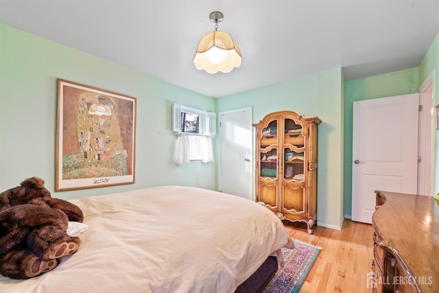 bedroom featuring light wood-type flooring