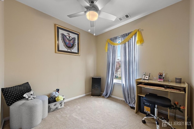 interior space featuring visible vents, baseboards, ceiling fan, and carpet floors