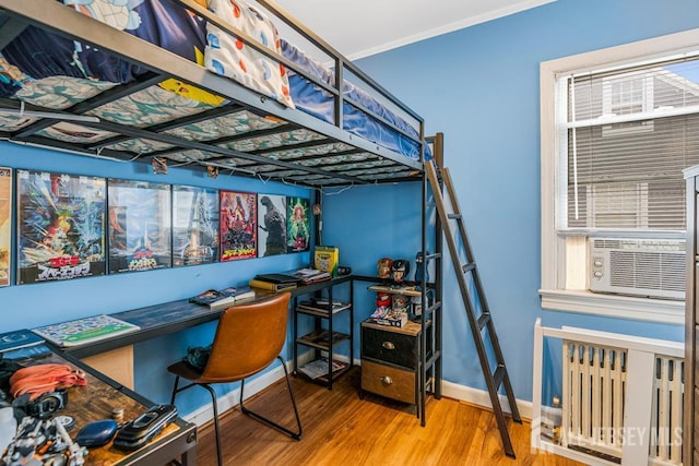 229 Harris Ave, Middlesex, NJ 08846 - bedroom featuring radiator heating unit and wood finished floors