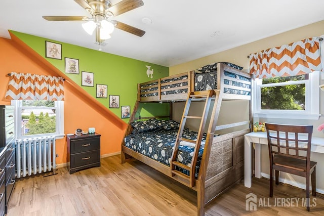 229 Harris Ave, Middlesex, NJ 08846 - bedroom with radiator heating unit and wood finished floors