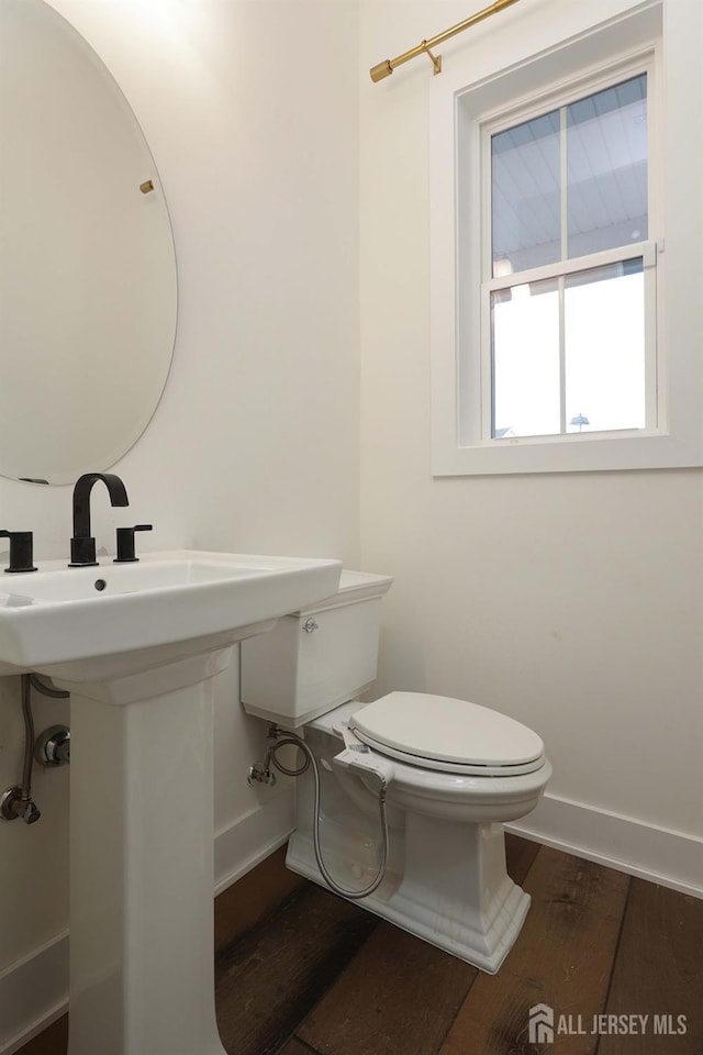 21 Cole Pl, Cranbury, NJ 08512 - bathroom with toilet, wood finished floors, a sink, and baseboards