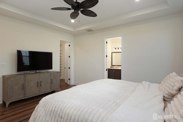 21 Cole Pl, Cranbury, NJ 08512 - bedroom featuring a tray ceiling, dark wood-style floors, recessed lighting, baseboards, and connected bathroom