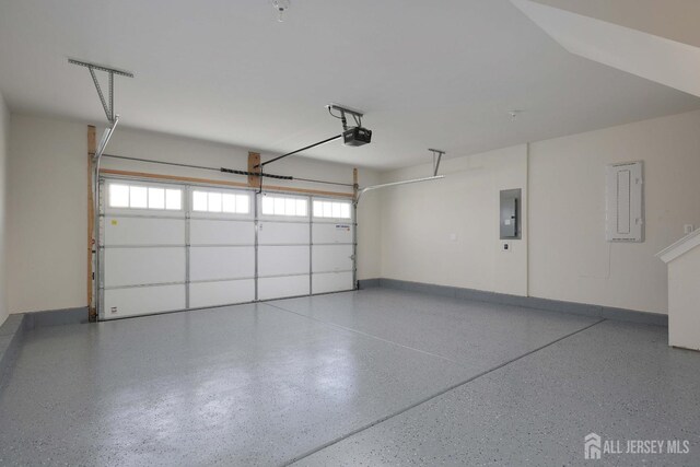 21 Cole Pl, Cranbury, NJ 08512 - garage with electric panel, baseboards, and a garage door opener