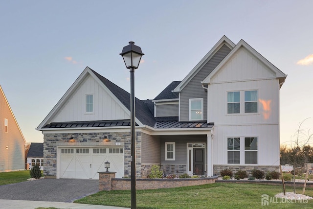 21 Cole Pl, Cranbury, NJ 08512 - view of front of home with a standing seam roof, driveway, a front lawn, and stone siding