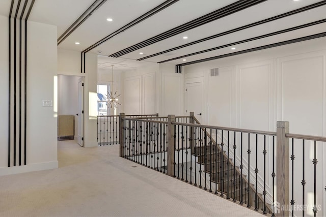 21 Cole Pl, Cranbury, NJ 08512 - hall featuring a chandelier, carpet, recessed lighting, and baseboards