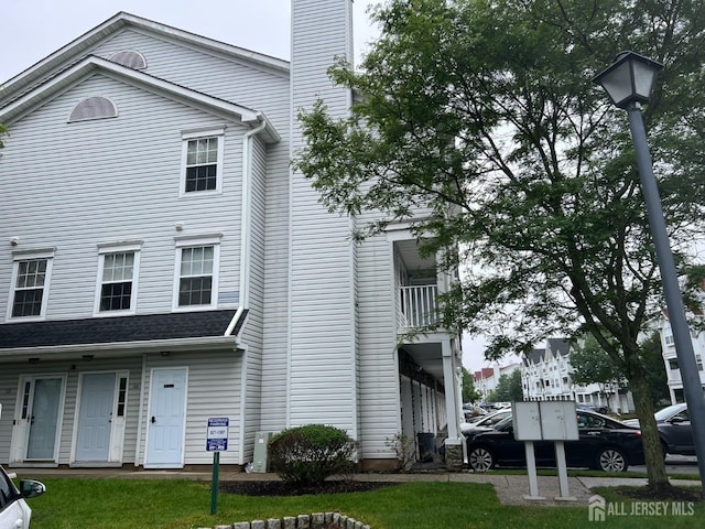 116 Prestwick Way, Edison, NJ 08820 - view of front of house featuring a chimney