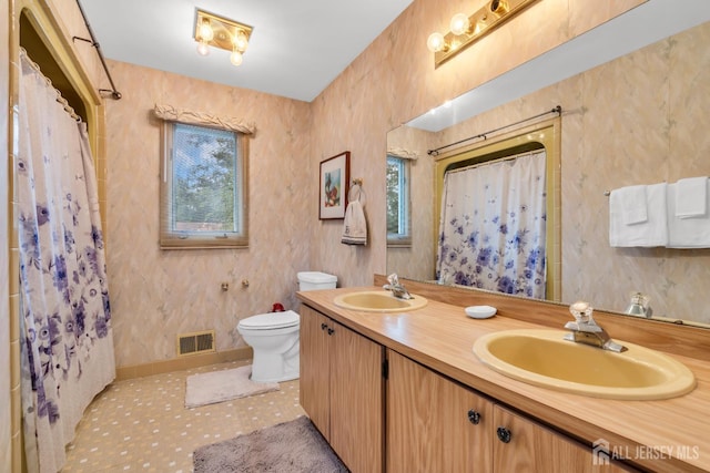 19 Ellen Cir, Old Bridge, NJ 08857 - bathroom with plenty of natural light, double vanity, and a shower with shower curtain
