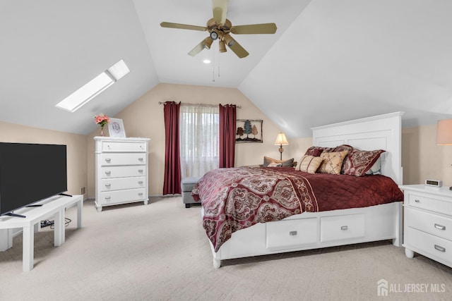 19 Ellen Cir, Old Bridge, NJ 08857 - bedroom featuring lofted ceiling, carpet flooring, a skylight, and ceiling fan