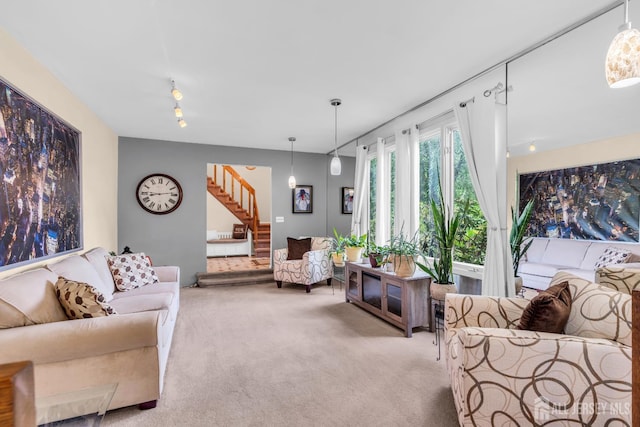 19 Ellen Cir, Old Bridge, NJ 08857 - living room with stairway, light carpet, and track lighting