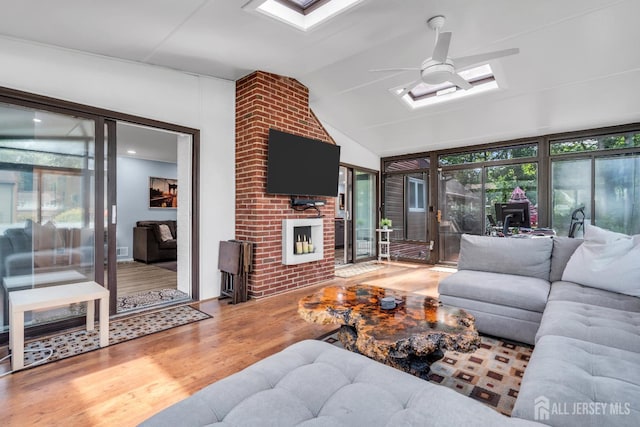 19 Ellen Cir, Old Bridge, NJ 08857 - living room with a skylight, wood finished floors, lofted ceiling, and a ceiling fan