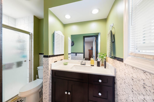 201 Summit Ave, Fords, NJ 08863 - bathroom with tile walls, vanity, wainscoting, and a shower stall