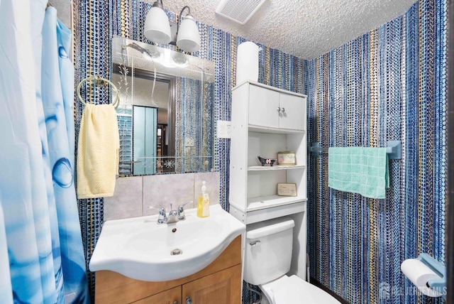 201 Summit Ave, Fords, NJ 08863 - full bathroom with vanity, wallpapered walls, and a textured ceiling