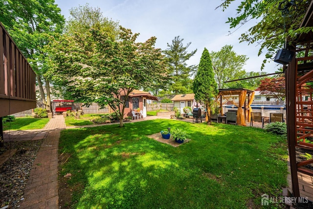 201 Summit Ave, Fords, NJ 08863 - view of yard featuring an outbuilding and a patio