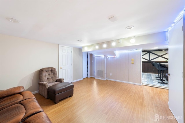 201 Summit Ave, Fords, NJ 08863 - living room featuring wood finished floors and rail lighting