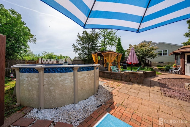 201 Summit Ave, Fords, NJ 08863 - fenced backyard featuring a gazebo and a patio area