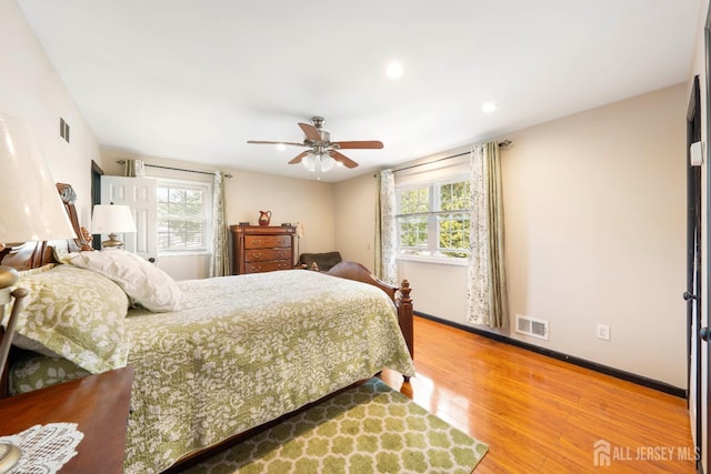 201 Summit Ave, Fords, NJ 08863 - bedroom with multiple windows, wood finished floors, ceiling fan, and recessed lighting