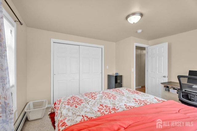 carpeted bedroom featuring a closet