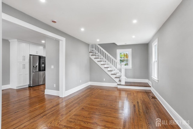 118 Hillside Ave, Woodbridge Proper, NJ 07095 - unfurnished living room featuring stairs, wood finished floors, and recessed lighting
