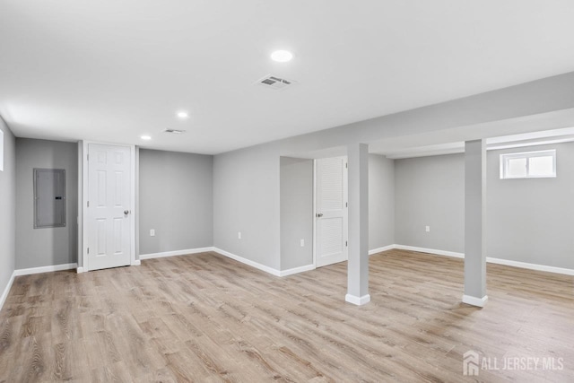 118 Hillside Ave, Woodbridge Proper, NJ 07095 - below grade area featuring electric panel, recessed lighting, and light wood-style floors