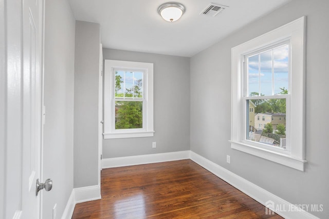 118 Hillside Ave, Woodbridge Proper, NJ 07095 - empty room featuring dark wood-type flooring and baseboards