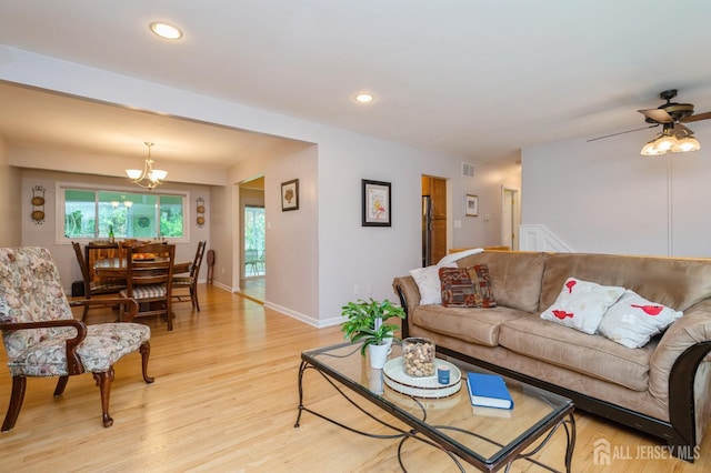 34 Bartman Rd, East Brunswick, NJ 08816 - living area featuring light wood-style flooring, a chandelier, a ceiling fan, and recessed lighting