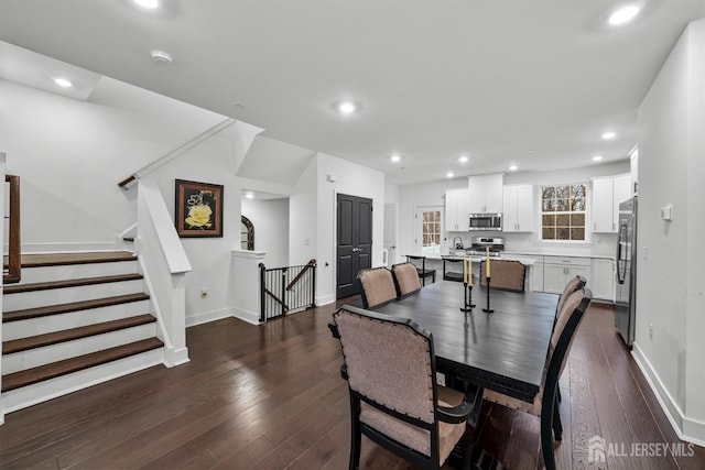 dining area with recessed lighting, stairway, baseboards, and dark wood-style flooring