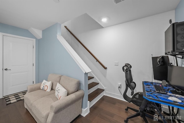 home office with dark wood-style floors and baseboards